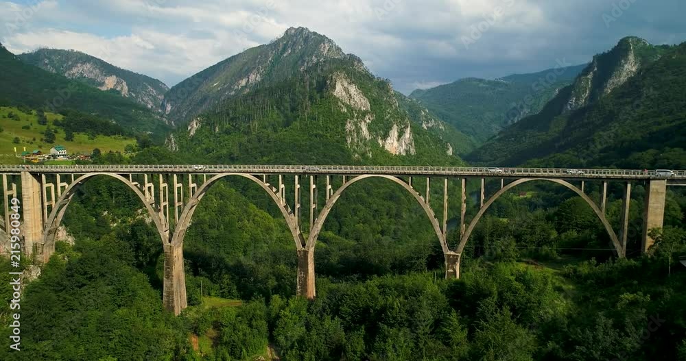 Aerial View of Durdevica Tara Arc Bridge in the Mountains, One of the Highest Automobile Bridges in Europe. Aerial View of Durdevica Tara Arc Bridge in the Mountains, One of the Highest Automobile Bridges in Europe.