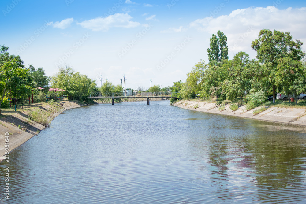 Naklejka premium Concrete channel with water.