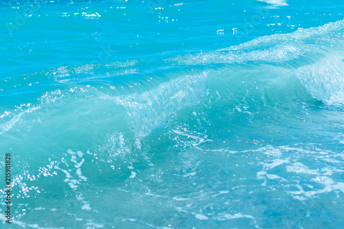 Blue water surface with wave. © Konstiantyn Zapylaie
