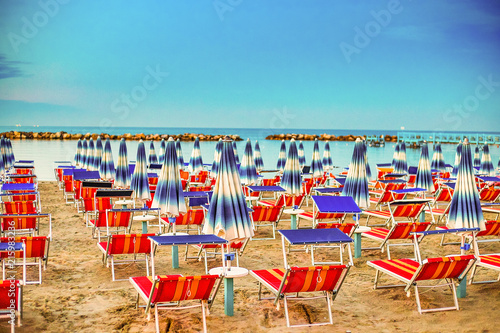 sunshades and deck chairs photo