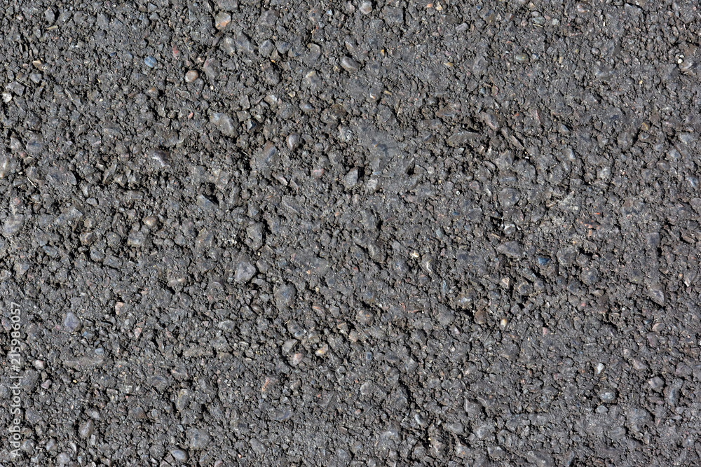 smooth grey asphalt pavement texture. heterogeneous structure of poor quality smooth grey asphalt pavement texture. heterogeneous structure of poor quality