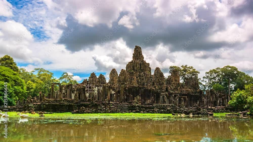 4K Time lapse of a Bayon temple at Angkor Thom reflected in water, Siem Reap province of Cambodia 4K Time lapse of a Bayon temple at Angkor Thom reflected in water, Siem Reap province of Cambodia
