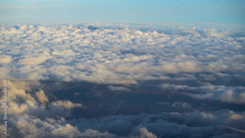 Flying over beautiful sky and clouds. Aerial view from airplane. Flying over beautiful sky and clouds. Aerial view from airplane.
