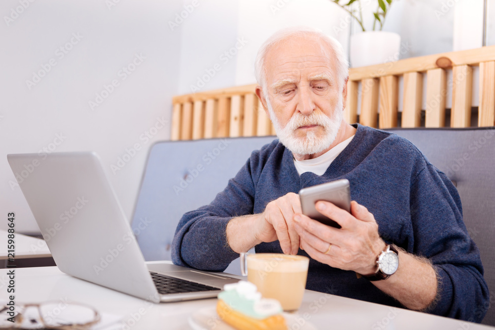 Great choice. Profession senior freelancer using laptop and typing number Great choice. Profession senior freelancer using laptop and typing number