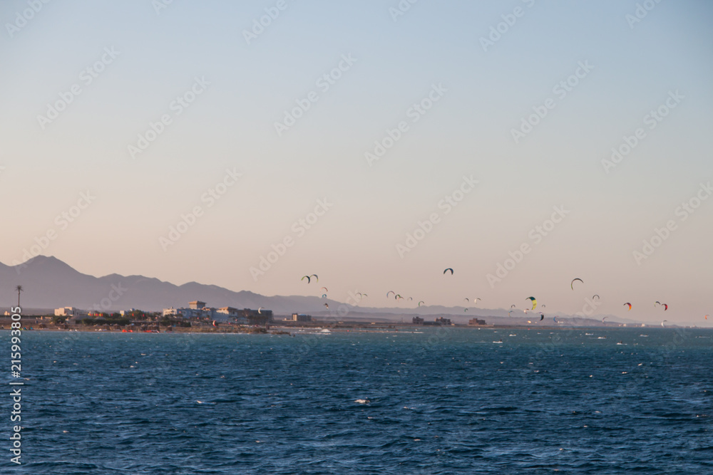 Kite Surfers Riding on the Red Sea at Sunset in El Gouna, Egypt.