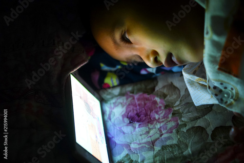Little Boy Playing With Smartphone In The Dark , Kids Addicted Playing With Smartphone