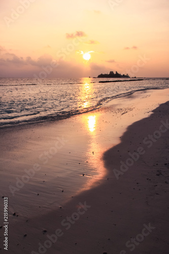 Wallpaper Mural Sunset over Maldives Island Beach, Island and Pacific Ocean. Torontodigital.ca