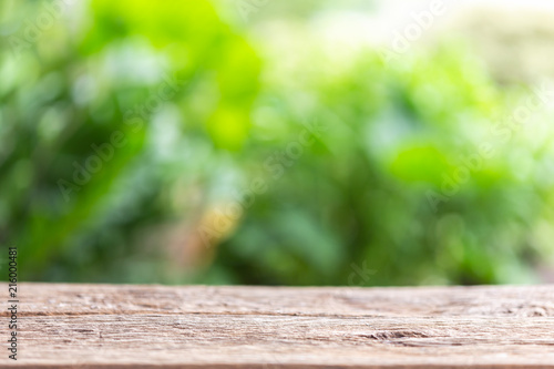 Empty space of top vintage wooden table or counter and sunny abstract blurred bokeh background