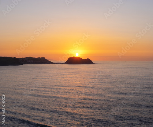 Island of San Anton and Cantabrian Sea at sunset in Getaria  Basque Country