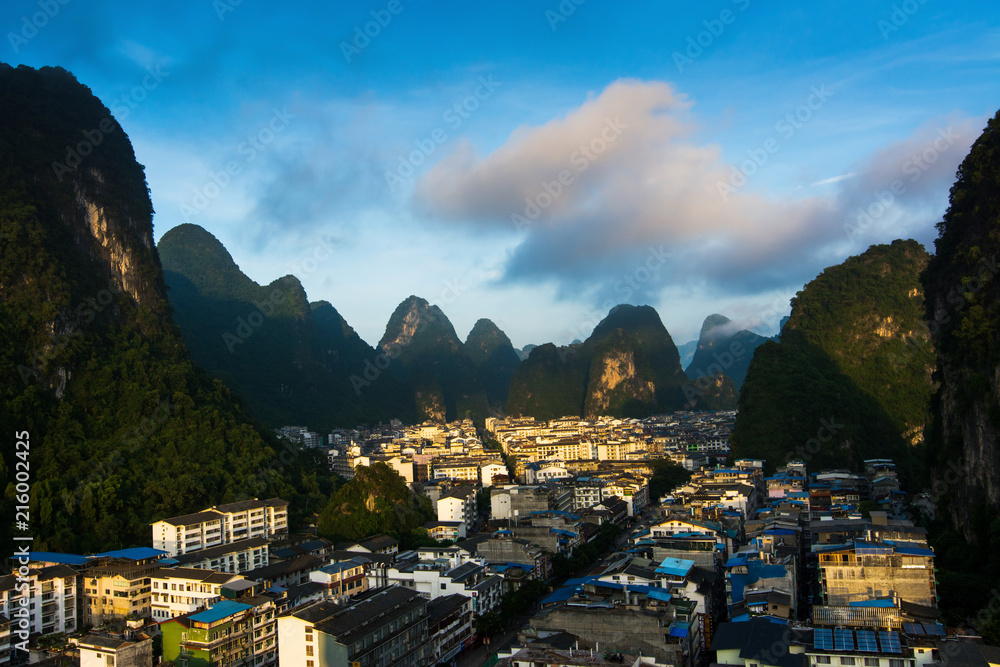 Cityscape of Yangshuo in China and famous karst formations