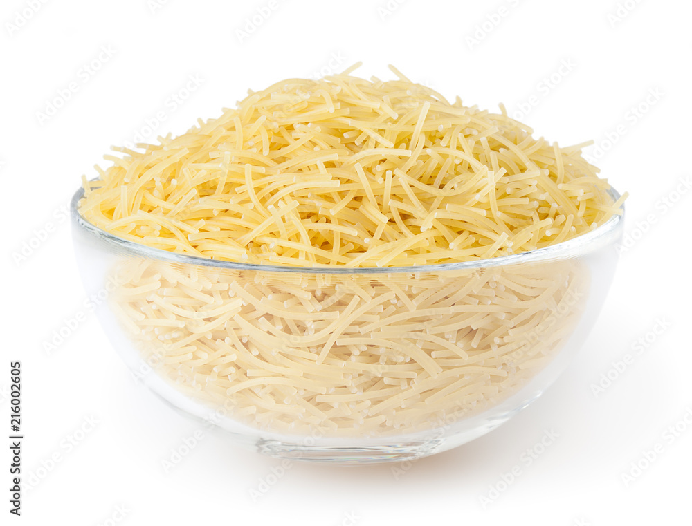 Uncooked vermicelli pasta in glass bowl isolated on white background with clipping path Uncooked vermicelli pasta in glass bowl isolated on white background with clipping path