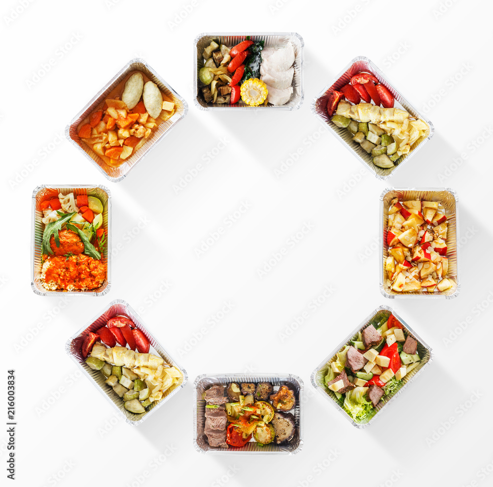 Healthy food delivery, daily ration. Frame on take away foil boxes foto