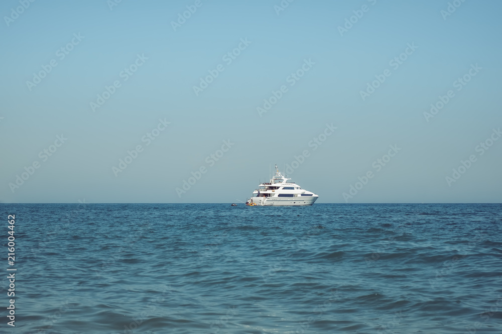 white yacht on the open sea