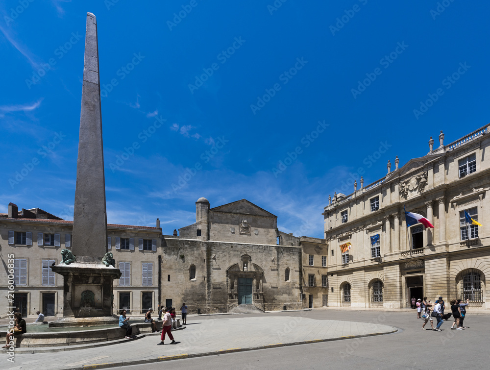 Chapelle Sainte Anne and city hall, Place de la Republique with obelisk in Arles. Camargue, Buches du Rhone, Provence, France..