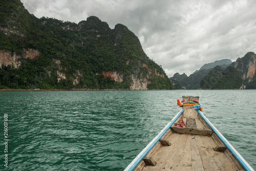 Travelling by boat to the Chiew Lan, Ratchaprapa Dam, Surathani, Thailand © acambium64