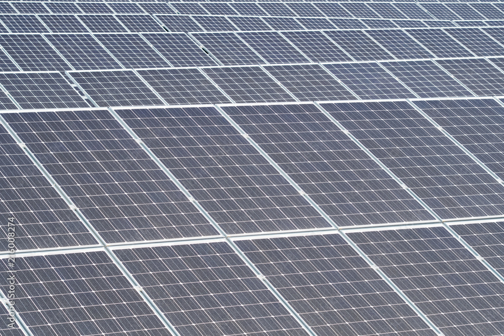 Texture of solar panels in the field. Ecolongically clean energy production. Alternative energy sources Texture of solar panels in the field. Ecolongically clean energy production. Alternative energy sources