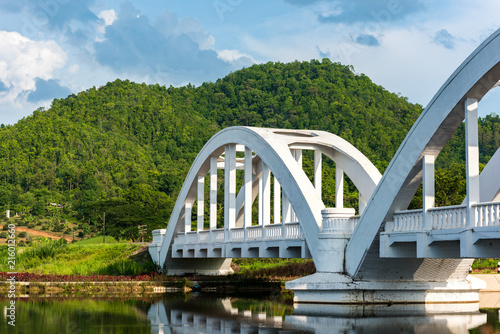 Old white railway bridge constructed at Lamphun, Thailand. © bouybin