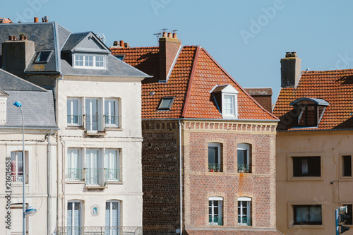 Facades of traditional residential houses with mansard stores in Dieppe, Normandy region, France. Norman style old houses. Beautiful european cityscape with typical french architecture