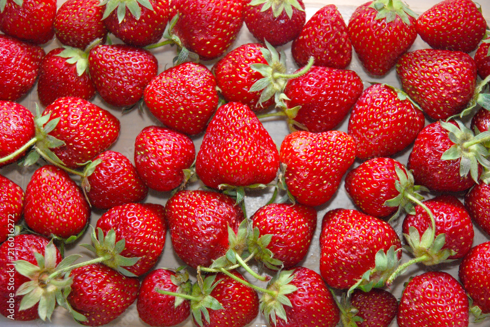 Fresh organic strawberry, background, directly from above Fresh organic strawberry, background, directly from above