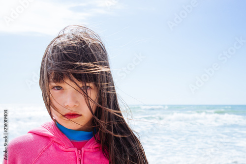 Rebecca Kornylak and two other kids playing in the surf at North Topsail Beach, NC photo