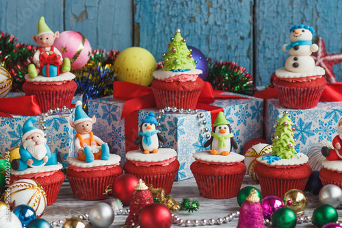 Christmas cupcakes with colored decorations