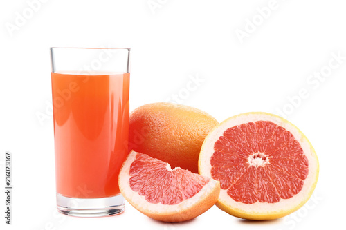 Ripe grapefruits and glass of juice isolated on white background
