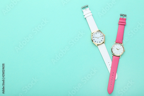 Wrist watches on mint background