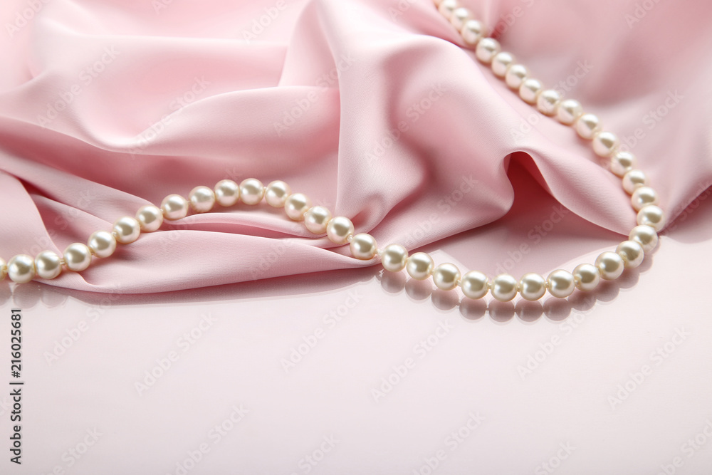Pearl necklace with pink satin fabric