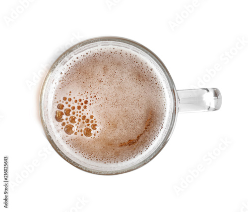 Glass mug with cold tasty beer on white background, top view