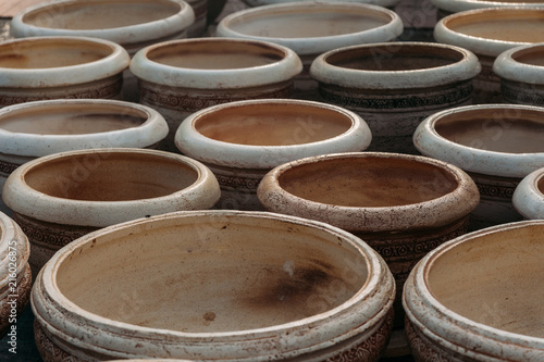 a lot of empty pots on ground