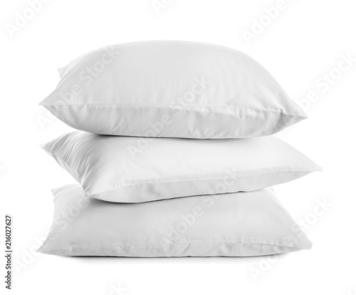 Clean soft bed pillows on white background