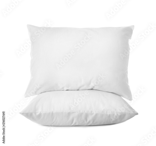 Clean soft bed pillows on white background