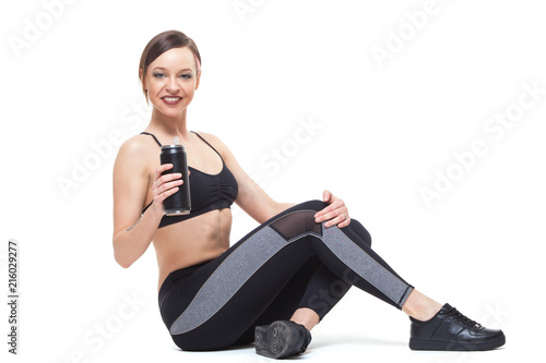 Beautiful young fitness woman. Isolated over white background.
