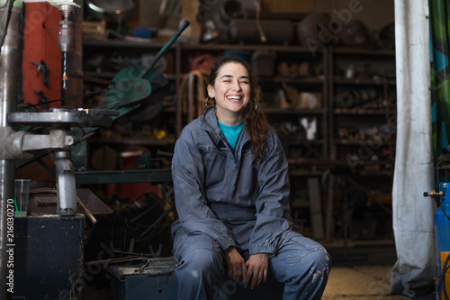 woman mechanic in a workshop photo