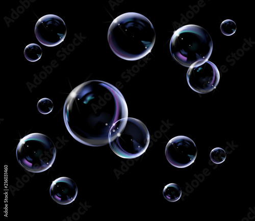 Realistic transparent soap bubbles with rainbow reflection. Isolated set composition. photo