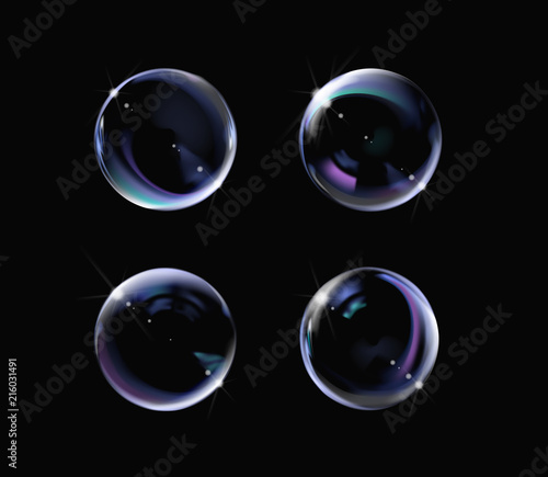 Realistic soap bubble with rainbow colors on black background. Soap Bubble set with glares. Bubbles illustration vector.