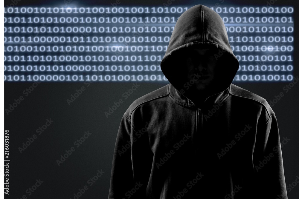 Thief in black clothes on grey background Thief in black clothes on grey background
