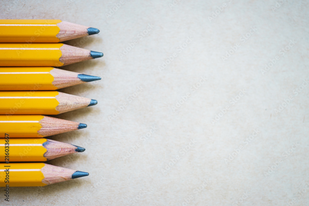 Pencils for sketching on paper with copy space, top view. Pencils for sketching on paper with copy space, top view.