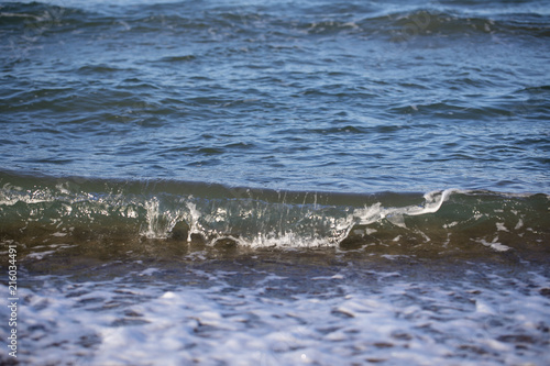 Wave on Clear Sand Beach © lucid_dream