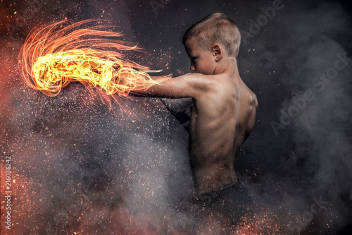 Shirtless young boxer with ...