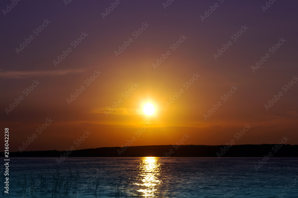 Fototapeta premium sunset over the river bank