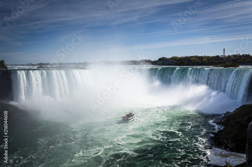 Ship close to Niagara Falls waterfall