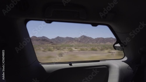 Arizona Desert Mountian Range Outside car Window on Highway photo