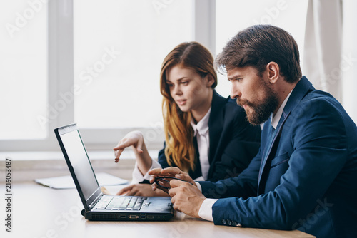 business colleagues with a laptop