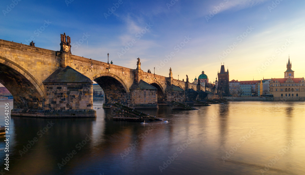 Morning view of Charles Bridge in Prague, Czech Republic. The Charles Bridge is one of the most visited sights in Prague. Architecture and landmark of Prague.