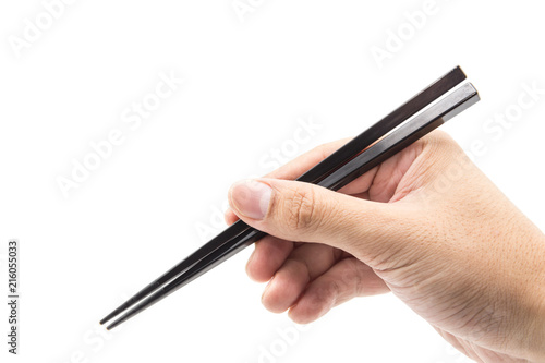Hand with chopsticks isolated on white background