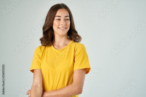 woman in a yellow t-shirt