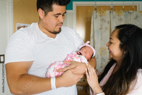 Mother and father with newborn