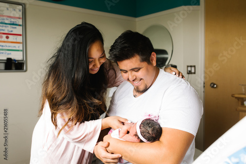 Mother and father with newborn