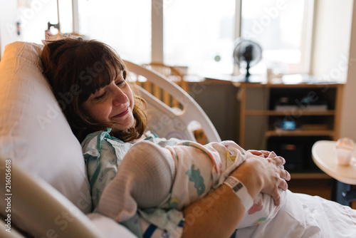 Mother bonding with newborn